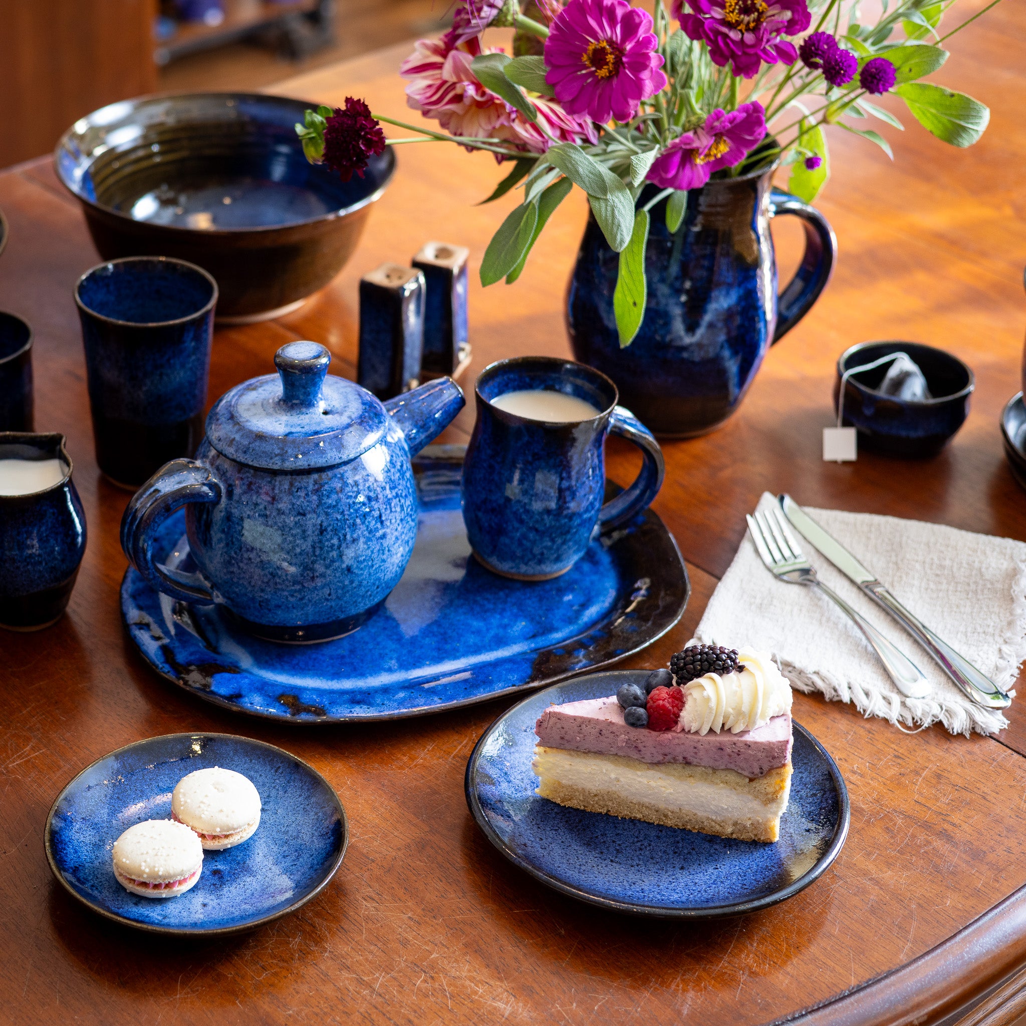 Handmade pottery six-piece dinnerware set finished in our rich speckled navy blue Midnight glaze.
